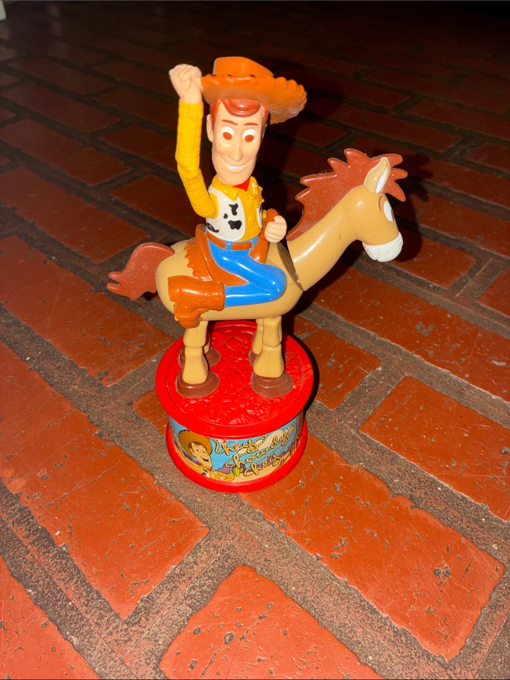 McDonald's Woody Cowboy candy dispenser in Tan, Orange, Blue and Red